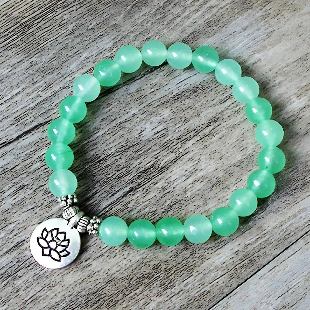 Charm Cute Bracelet With Spiritual Symbols - A Lotus