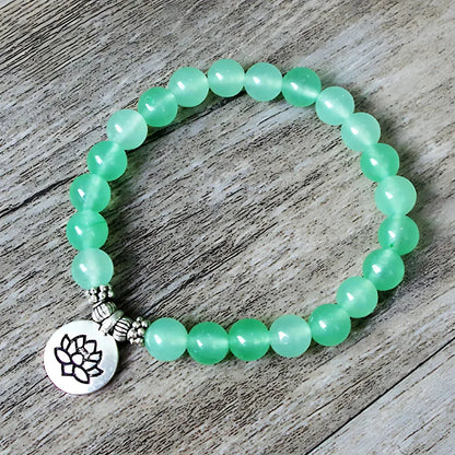 Charm Cute Bracelet With Spiritual Symbols - A Lotus