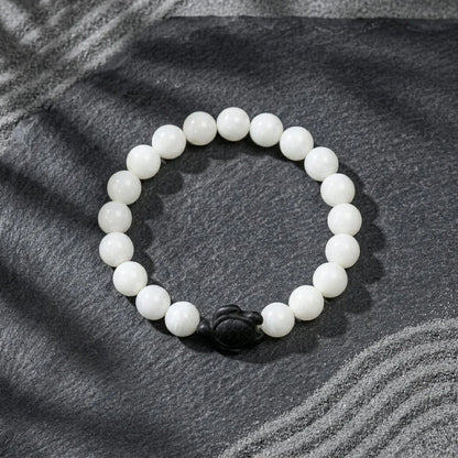 White Stone Bracelet With Turtle Charm Design
