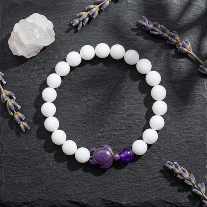 White Stone Bracelet With Turtle Charm Design