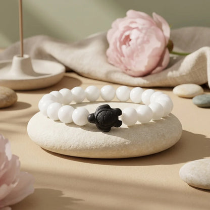 White Stone Bracelet With Turtle Charm Design